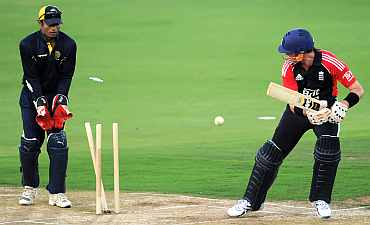 Graeme Swann is clean bowled during the tour match between England and Hyderabad XI