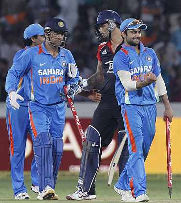 Indian players celebrate after winning the ODI