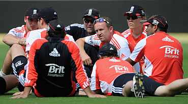 Coach Andy Flower speaks to the team during practice session