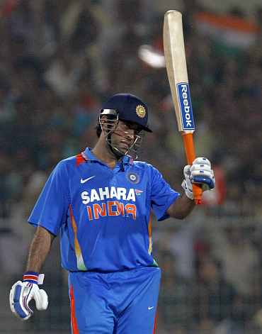 MS Dhoni reacts after reaching his half-century