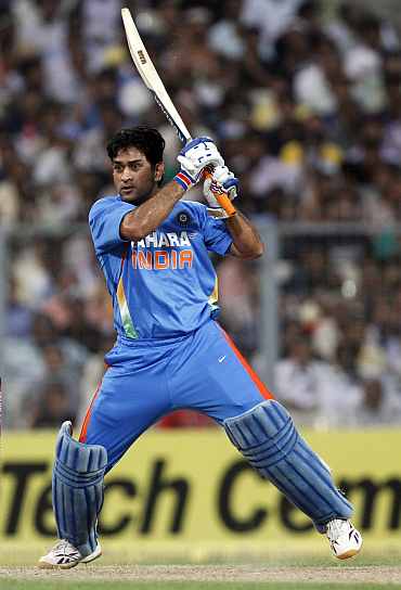 MS Dhoni hits a boundary during his knock against England