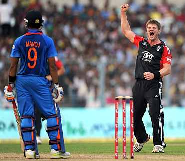 Stuart Meaker celebrates after bagging the wicket of Manoj Tiwary