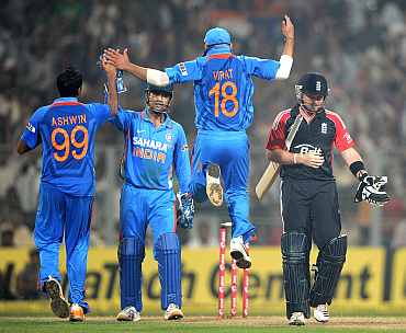 R Ashwin celebrates after dismissing Ian Bell