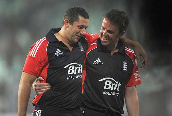 Graeme Swann celebrates with Tim Bresnan after won the Twenty20 match against India