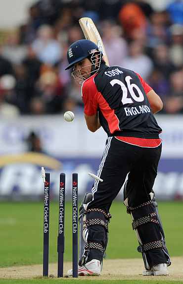 Alastair Cook is clean bowled by Praveen Kumar in the 1st ODI