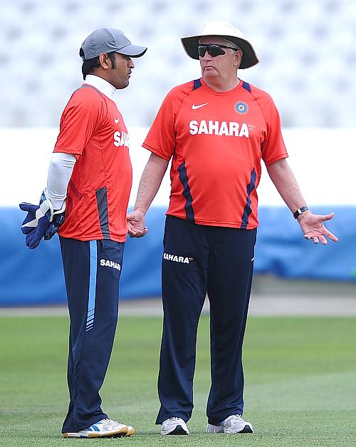 Mahendra Singh Dhoni of India talks with Duncan Fletcher