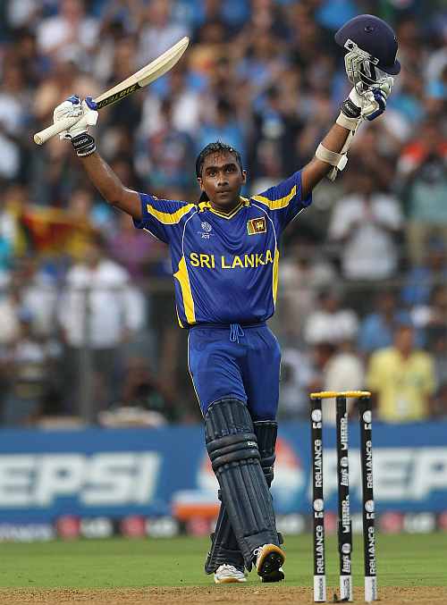 Mahela Jayawardene celebrates after making a century in the World Cup final