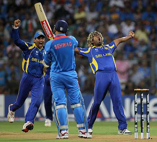 Lasith Malinga celebrates after picking up Virender Sehwag's wicket during the World Cup final