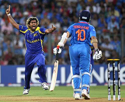 Lasith Malinga celebrates the wicket of Sachin Tendulkar during the World Cup final