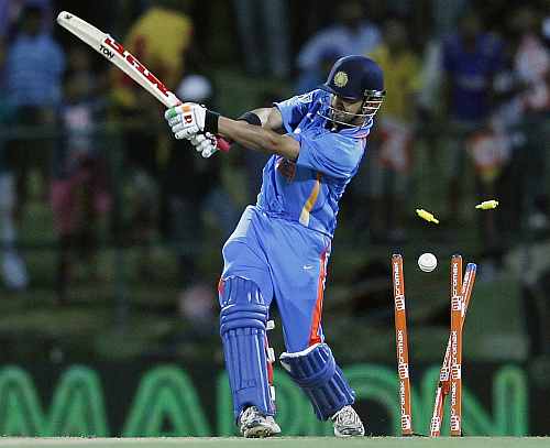 India's Gautam Gambhir is bowled out by Sri Lanka's Shaminda Eranga during their Twenty20 match in Pallekele