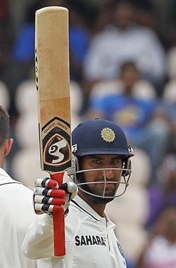 Cheteshwar Pujara celebrates after getting to hundred