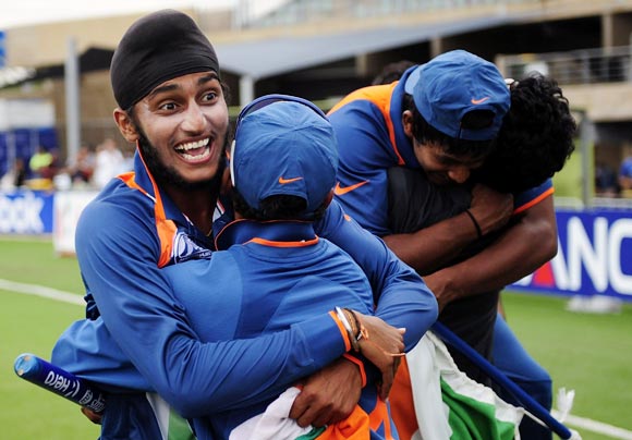 Harmeet Singh (left) celebrates with team-mates