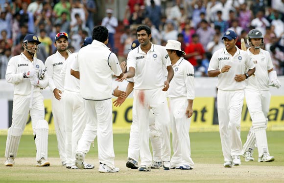 The Indian team celebrate after winning the first Test