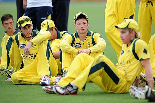 Australian players look dejected after the 2012 ICC U19 Cricket World Cup Final between Australia and India
