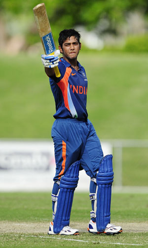 Unmukt Chand of India waves to the crowd after scoring century during the match between Australia and India on day five of the U19 International Quad Series at Tony Ireland Stadium in Townsville on April 15, 2012