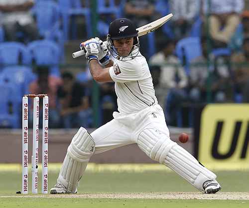 New Zealand's Kruger Van Wyk hits a shot during the first day of their second Test match against India in Bangalore