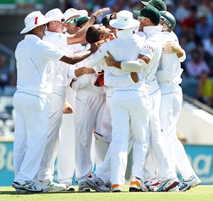 South African players celebrate after winning the Test