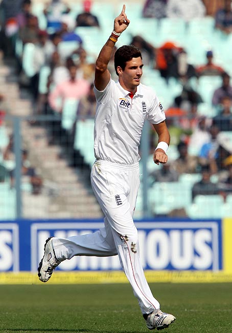 Steven Finn celebrates the wicket of Mahendra Singh Dhoni