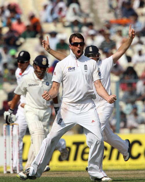Graeme Swann celebrates after picking the wicket of Sachin Tendulkar