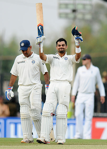 Virat Kohli of India celebrates after scoring a century against England on Saturday