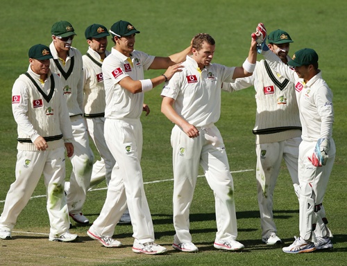 Peter Siddle (centre) of Australia celebrates with teammates