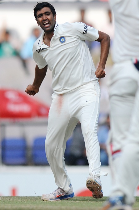Ravichandran Ashwin of India celebrates the wicket of Alastair Cook