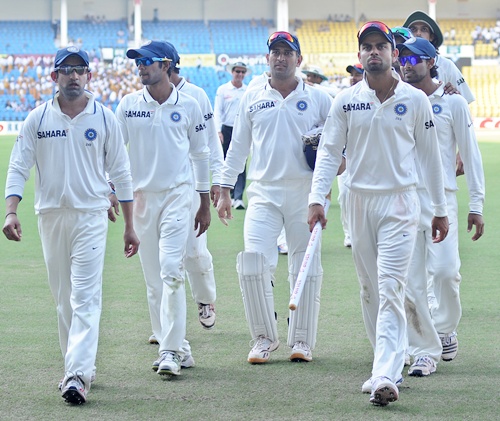 Team India walks back after the days play