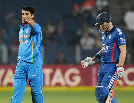 Yuvraj Singh celebrates after claiming the wicket of Luke Wright