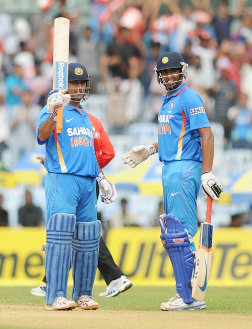 Dhoni happy being a 'punching bag'