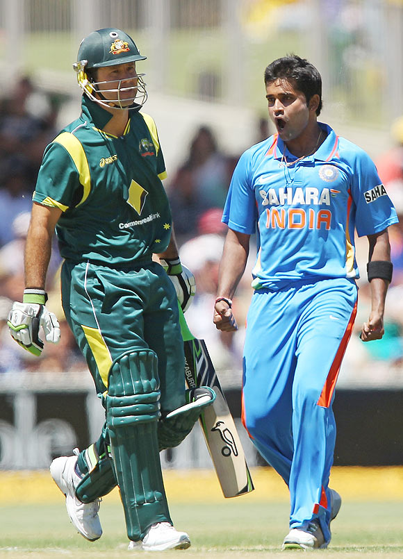 Vinay Kumar (right) of India celebrates after getting the wicket of Ricky Ponting