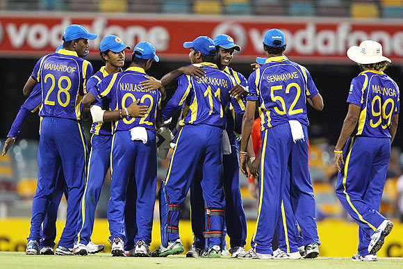 Sri Lankan team celebrates their win over India