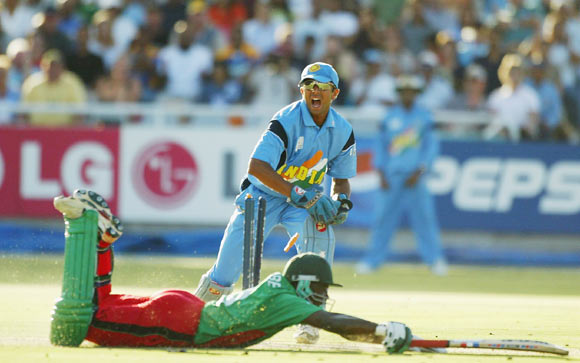 Indian wicketkeeper Rahul Dravid appeals to the Umpire for a run out while Maurice Odumbe of Kenya reaches for the crease during the ICC Cricket World Cup Super Six game