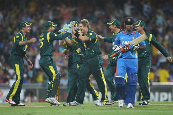 Shane Watson of Australia celebrates dismissing Suresh Raina of India during the One Day International match between Australia and India at the Sydney Cricket Ground