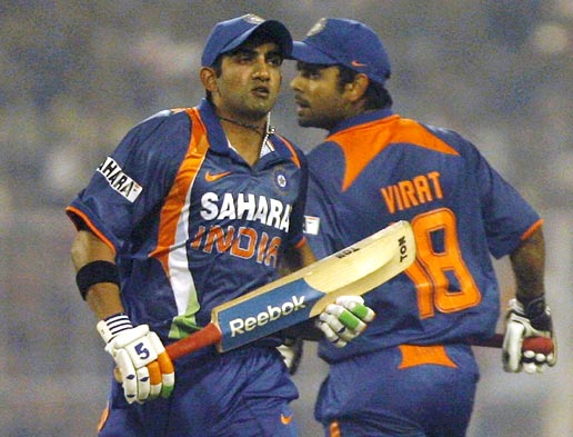 Gautam Gambhir (left) and Virat Kohli run between the wickets during their fourth ODI against Sri Lanka in Kolkata, on December 24, 2009