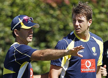 Australia's Ricky Ponting (left) talks to bowler James Pattinson during a practice session on Monday