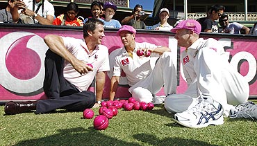 Former Australian fast bowler Glenn McGrath (left) poses with Brad Haddin (right) and James Pattinson during a McGrath Foundation event at the SCG on Monday