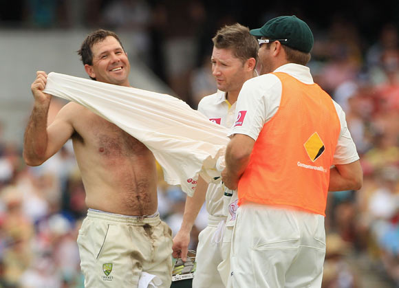 Ricky Ponting of Australia changes his shirt during day two of the Second Test Match between Australia and India at Sydney Cricket Ground