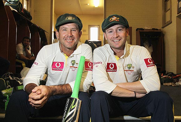 Ricky Ponting (left) and Michael Clarke celebrate in the dressing room after their 288-run partnership