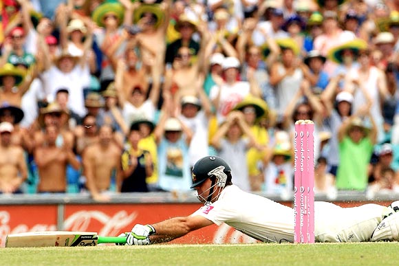 Ricky Ponting dives to bring up his century