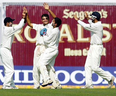 Indian cricket captain Sourav Ganguly is congratulated by team mates in Kolkata