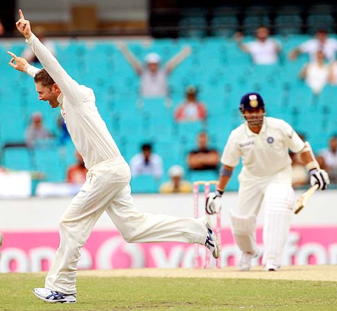 Michael Clarke celebrates getting the wicket of Sachin Tendulkar