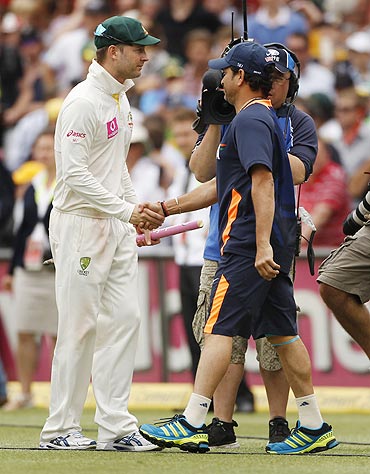 Australia's captain Michael Clarke (left) shakes hands with India's Sachin Tendulkar