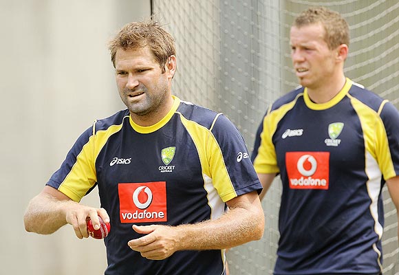 Ryan Harris with Peter Siddle at a nets session
