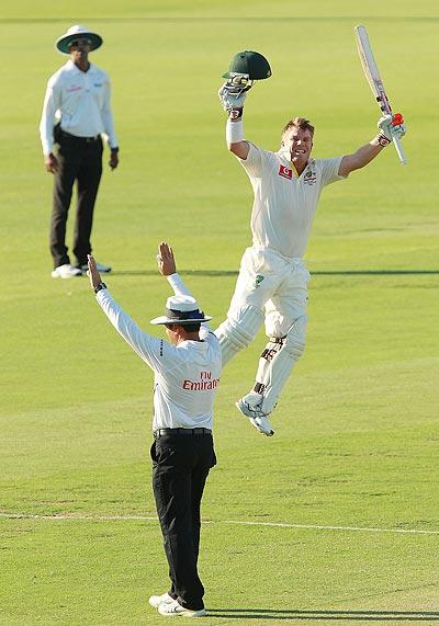 David Warner of Australia celebrates his century