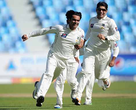 Mohammaed Hafeez celebrates after picking up a wicket
