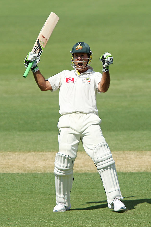 Ricky Ponting celebrates after getting a century on Monday