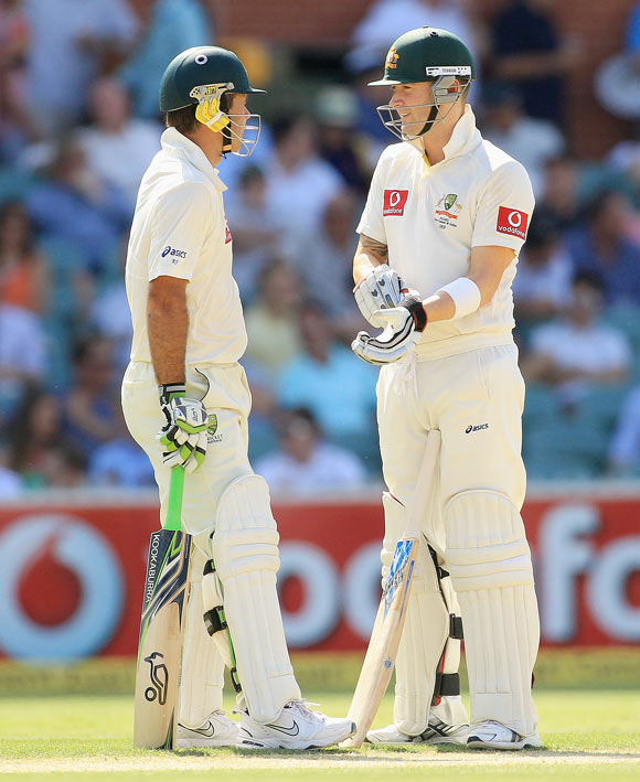 Ponting and Clarke talk during their innings on Monday