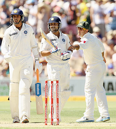 Ricky Ponting restrains Virat Kohli as he argues with Australian players