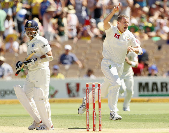 Peter Siddle of Australia celebrates the wicket of Sachin Tendulkar of India during day three of the Fourth Test Match between Australia and India at Adelaide Oval
