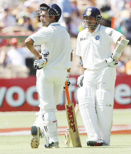 Gautam Gambhir (L) and Sachin Tendulkar (R) of India wait for a replay to determine if Tendulkar is out or not (he as given out) during day three of the Fourth Test